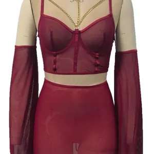 Three-piece sexy burgundy sheer mesh lingerie set with gold chain detail on mannequin