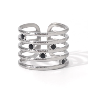 Detailed view of wide 18K gold-plated multi-layer ring with textured hammer finish