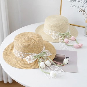 Flat top raffia sun hats with elegant lace ribbons and tulip charms for women