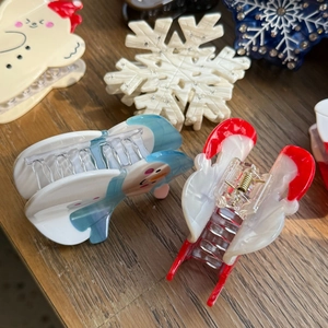 Détails de diverses pinces à cheveux de Noël en acétate avec Père Noël et bonhommes