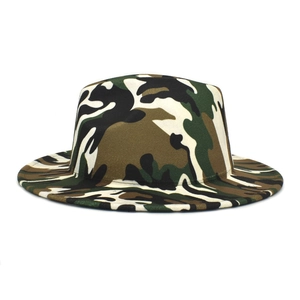 Detailed view of the jungle camouflage pattern on the wool fedora hat fabric texture