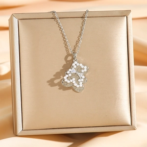 Exquisite silver teddy bear pendant necklace with pearls and zircon in a jewelry box