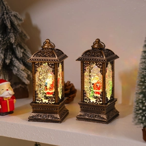 Close-up of vintage bronze Christmas lanterns with Santa Claus and sparkling glitter light