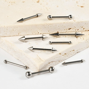 Set of G23 titanium tongue rings and nipple bars with ball and cone ends on stone