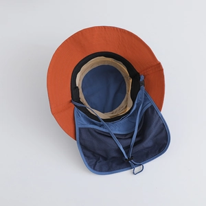 Detail of quick-dry sun hat with orange brim, blue neck flap and breathable mesh mesh