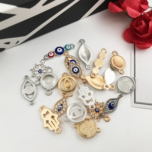 Golden and silver Evil Eye and Hamsa jewelry connectors for DIY necklace making