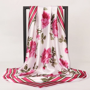 Satin floral silk scarf with pink roses and green leaves on white background