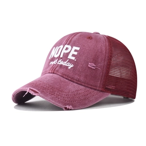 Distressed wine red NOPE baseball trucker hat with breathable mesh and curved brim