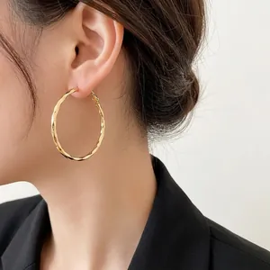 Classic 14k gold plated twisted hoop earrings for women with minimalist round design