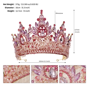 Detail of pink rhinestone crown featuring gold base, 16cm diameter and 12.7cm height