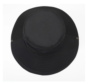 Close-up of black wide brim sun hat showing breathable mesh and bronze metal snap button