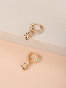 Golden bear dangle earrings with sparkling zircon stones in a minimalist Korean style