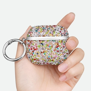 Close-up of sparkling colorful rhinestones on the protective case with silver metal ring