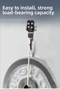 Detail showing guitar headstock hook supporting 15kg load with heavy weight test