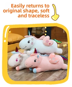 Cute soft glowing unicorn plush toy with colorful horn and heart wings for kids birthday gift