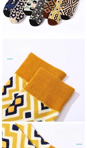 Close-up of elastic cuffs and non-slip heels on vintage geometric pattern crew socks