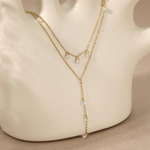 Elegant double-layered Y-shaped gold necklace with sparkling water-drop rhinestones