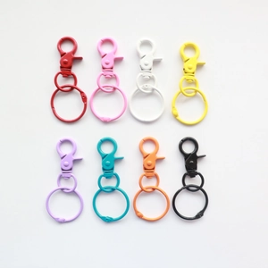 Eight colors of metal lobster claw clasps arranged in a 2x4 grid for DIY bag hardware accessories