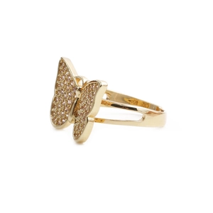 Detailed side view of golden butterfly ring with sparkling pink cubic zirconia stones