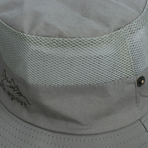 Close-up of grey outdoor bucket hat featuring mesh vents and JG-sport mountain logo