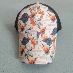Howdy highlander cow print trucker hat with black mesh back and stars and cactus design
