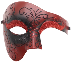 Detail of red and black glitter phantom mask with classic retro scrollwork pattern
