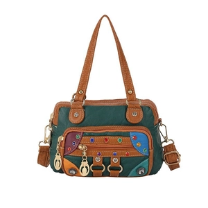 Green and brown patchwork faux leather shoulder bag with colorful studs and rhinestones