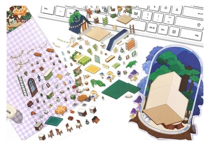 Detailed close-up of decorative interior scene stickers placed on a laptop keyboard