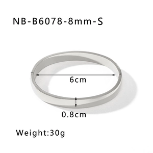 Polished stainless steel bangle detail showing 6cm inner diameter and 0.8cm band width