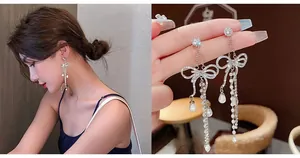 Detail view of silver bow tassel earrings with pearls and rhinestones on model