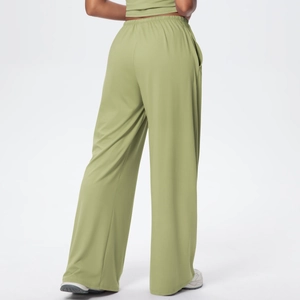 Detail view of the back of light green high-waisted wide-leg sweatpants for women