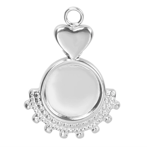 Macro view of silver heart-shaped stainless steel pendant with beaded detail and round setting