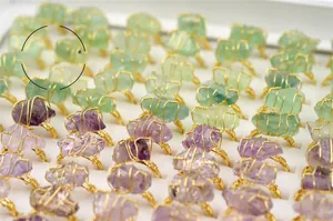 Wholesale collection of handmade wire wrapped natural amethyst and fluorite crystal rings