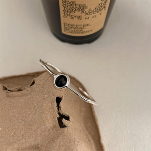 Minimalist S925 sterling silver open bangle featuring a black onyx oval stone inlay