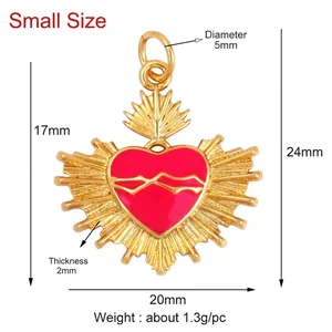 Detailed view of red enamel heart pendant with dimensions 24mm x 20mm and gold metal finish