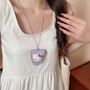 Detail of purple leather Hello Kitty glasses holder necklace with litchi grain texture