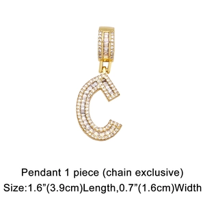 Macro shot of gold-plated cubic zirconia letter C pendant with dimension markings