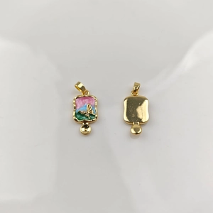 Detail of colorful enamel flower pendant with golden butterfly relief for DIY jewelry