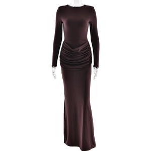 Close-up of ruched waist detail on a brown bodycon long sleeve dress with fishtail hem