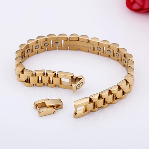 Detailed close-up of gold titanium germanium bracelet with functional 99.99% studs
