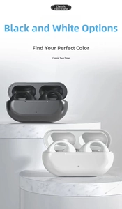 Detailed view of black and white ear-clip TWS bone conduction headphones on marble stands