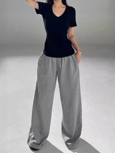 Women's chic V-neck black T-shirt and loose grey wide-leg lounge pants set