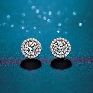 Close-up of D color Moissanite stud earrings in 925 silver with elegant halo design