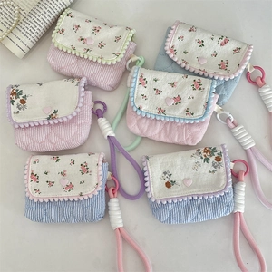 Floral cotton CCD camera pouch with quilted fabric and mini plush ball pom decorative detail