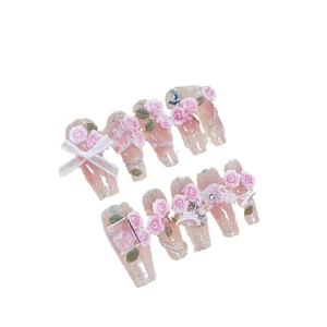 Faux ongles dégradés roses faits main avec roses 3D, nœuds en dentelle et perles