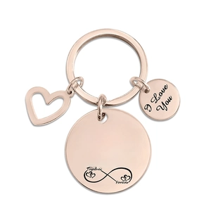 Rose gold stainless steel keychain with engraved round tags and hollow heart charm