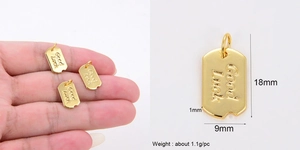 Detailed view of Good Luck engraved brass moon pendant with size and weight measurements
