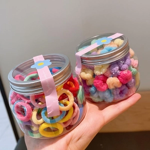 Colorful high elastic hair ties set in a clear plastic jar for girls and toddlers