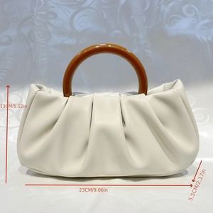 Detail view of cream cloud bag with resin ring handle and pleats, size 23x13x5.5cm