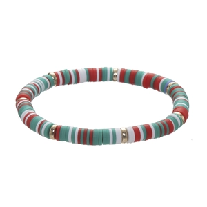 Christmas beaded bracelet with Santa and tree charms in red, green and white clay beads